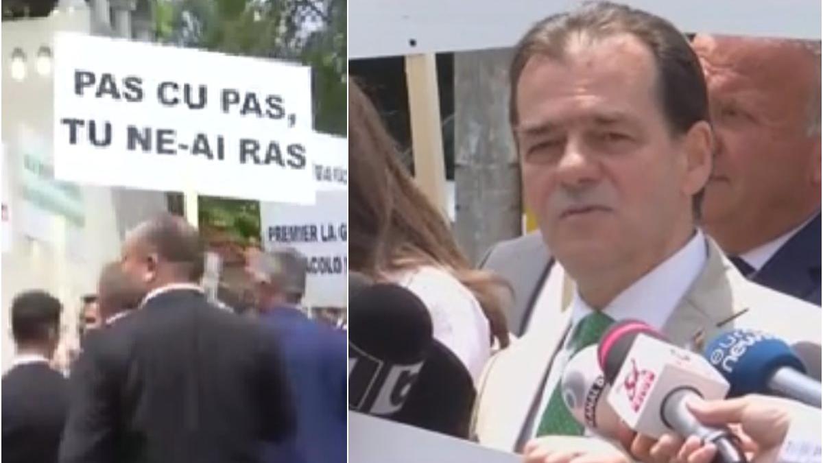 Protest cu pancarte în fața Palatului Cotroceni Ludovic Orban mesaj