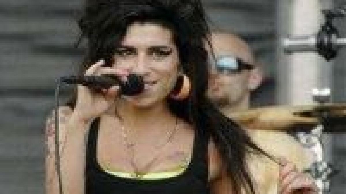 Amy Winehouse donează 100.000$ unui orfelinat din România <font color=red>(VIDEO)</font>