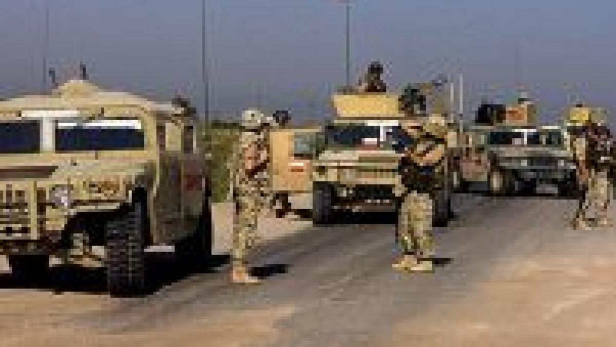 Polonia îşi va retrage militarii din Irak în 2008