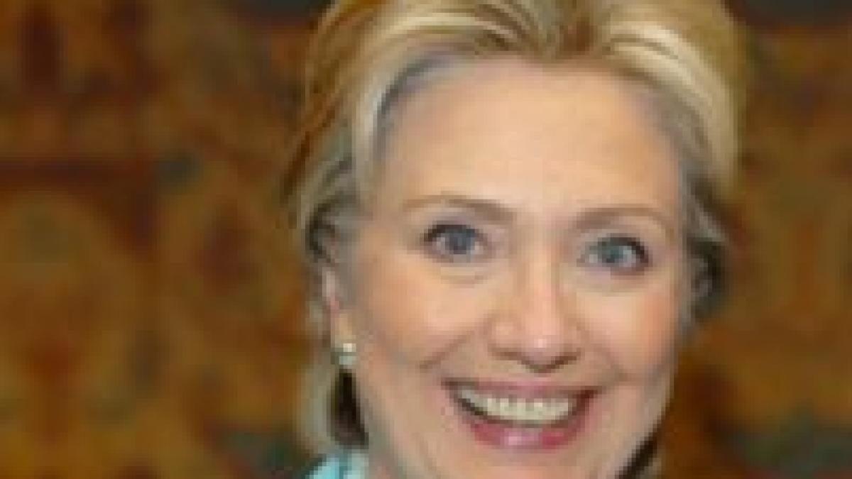 Hillary Clinton şi-a ignorat soţul pentru a-l săruta pe Obama
