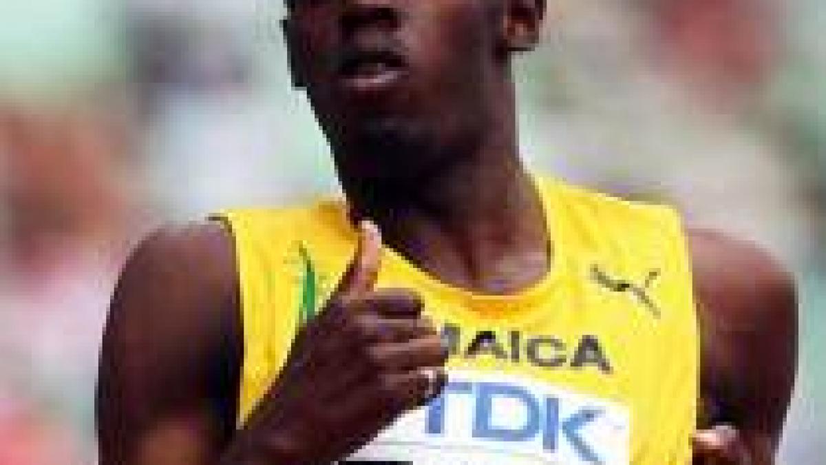 Atletul Usain Bolt testează maşini de Formula 1 şi se antrenează cu Real Madrid