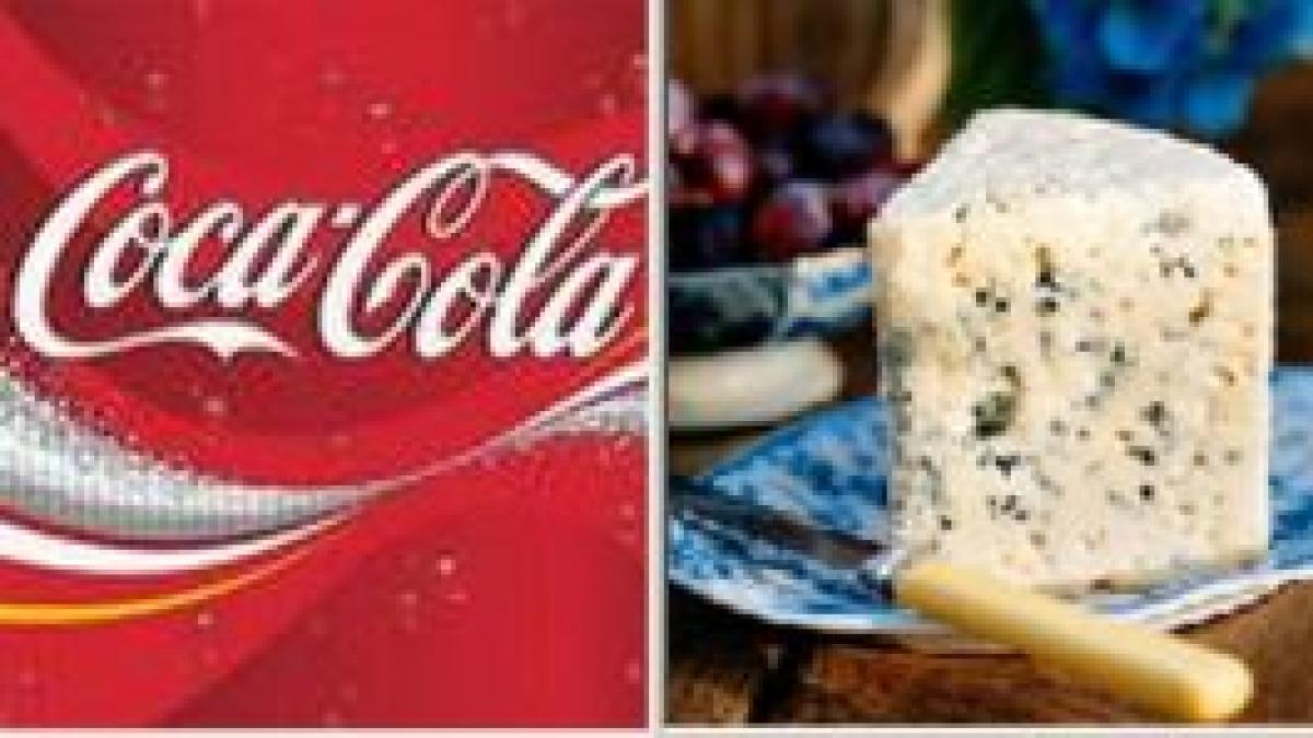 Francezii cer mărirea taxei de import pentru Coca Cola, după ce SUA au sporit taxa pentru brânza Roquefort
