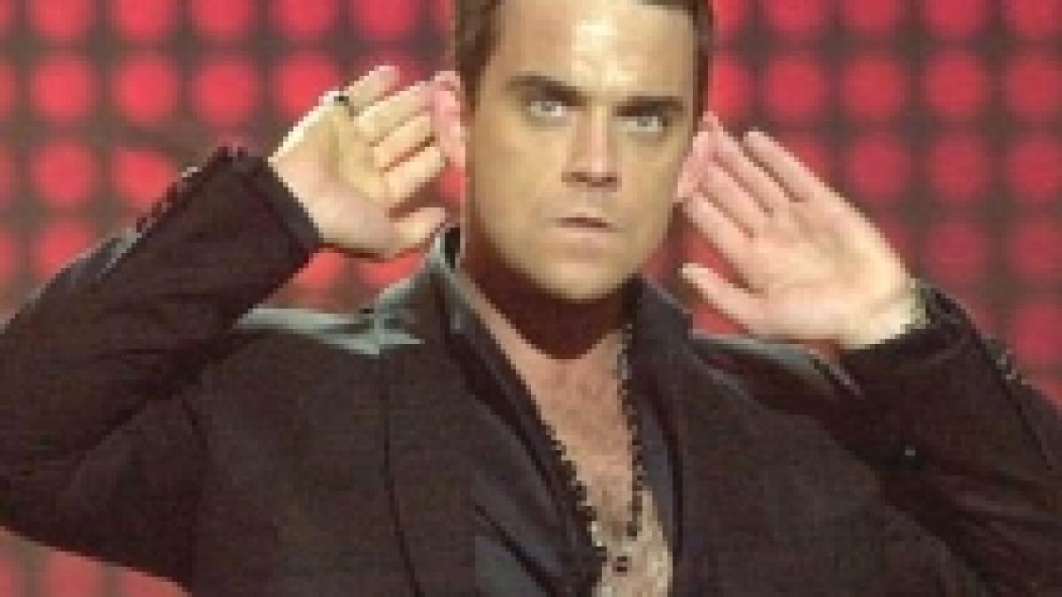 Robbie Williams este pregătit să revină în Take That