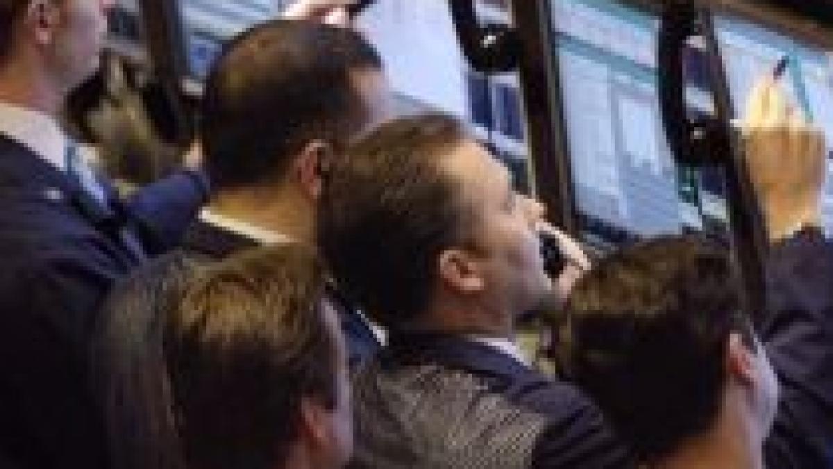 Bursa americană scade, urmărind tendinţa de la Shanghai
