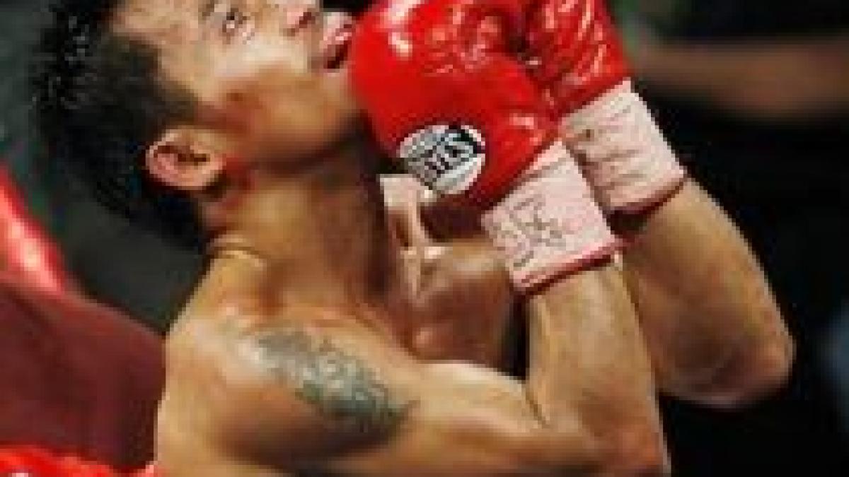 Box. Pacquiao îl face praf pe Cotto şi câştigă a şaptea centură mondială din carieră (VIDEO)