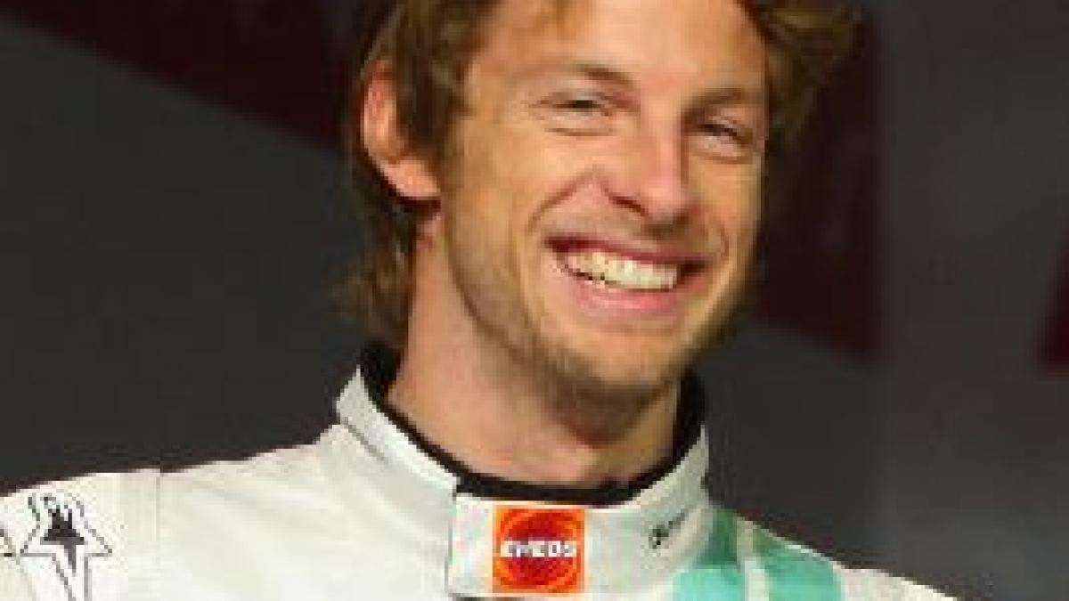 Jenson Button a semnat un contract cu McLaren şi va concura alături de Lewis Hamilton