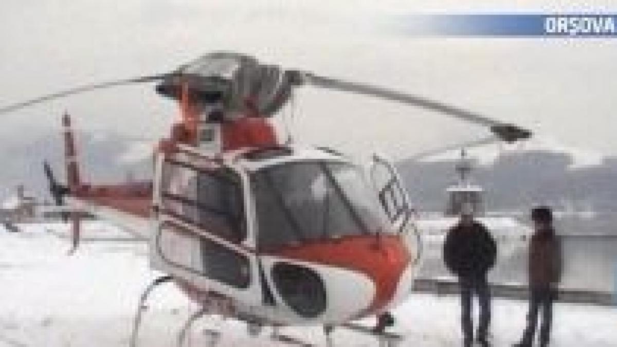 Ninsoarea din sud-vestul ţării pune probleme. Un elicopter, pe punctul de a se prăbuşi la Orşova