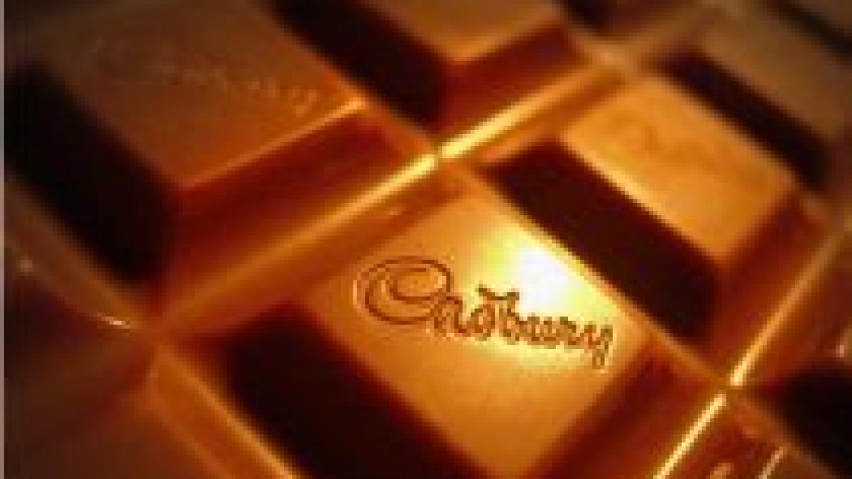 Kraft renunţă la operaţiunile Cadbury din România şi Polonia şi cumpără compania britanică