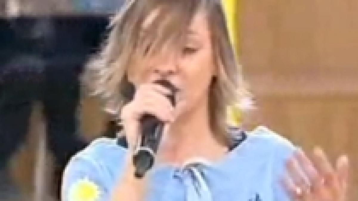 Româncă adoptată de un cuplu de italieni, vedeta unui concurs muzical (VIDEO)