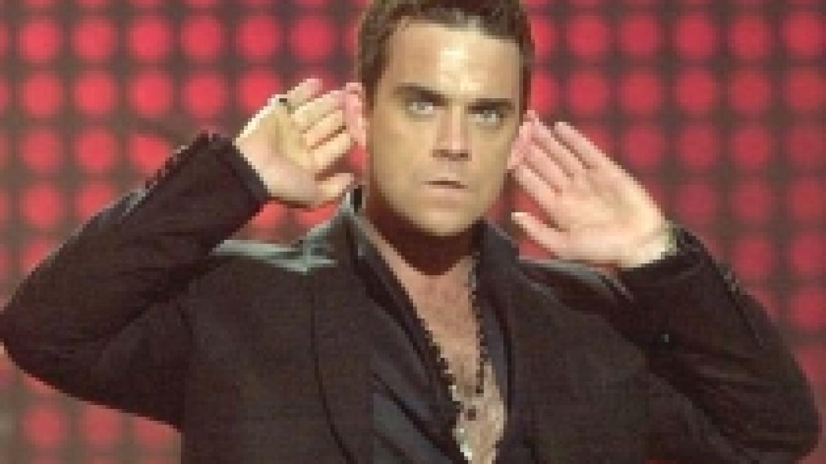 Robbie Williams cântă alături de Take That, după 15 ani