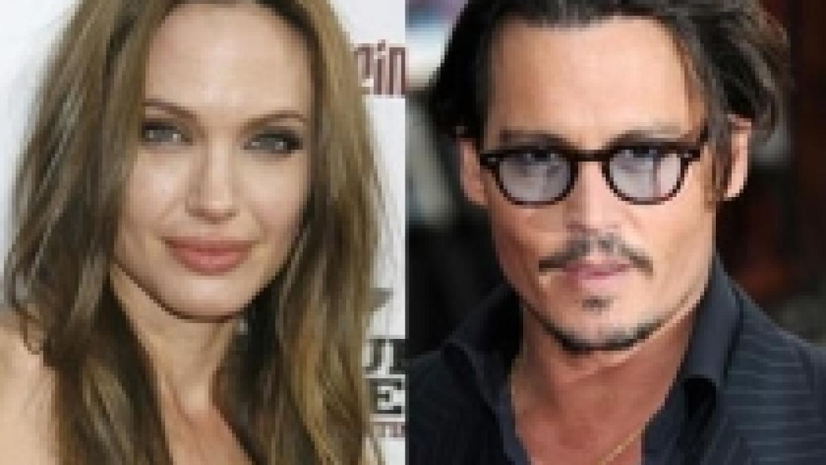 Angelina Jolie şi Johnny Depp, surprinşi în timpul filmărilor pentru lungmetrajul The Tourist (VIDEO)