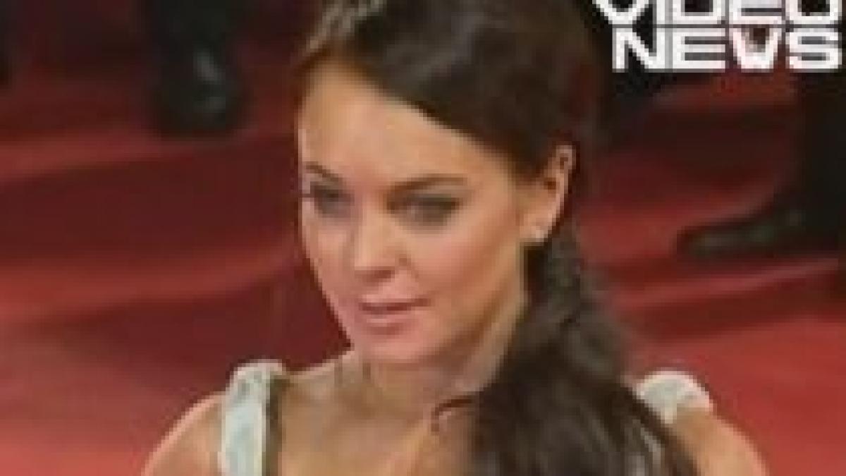 Lindsay Lohan trebuie să poarte o brăţară care detectează consumul de alcool 