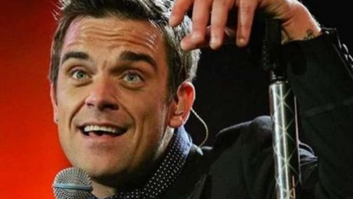 Robbie Williams a uitat versurile în timpul unui concert - VIDEO