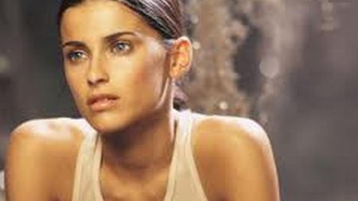 Nelly Furtado donează milionul de dolari primit de la Gaddafi