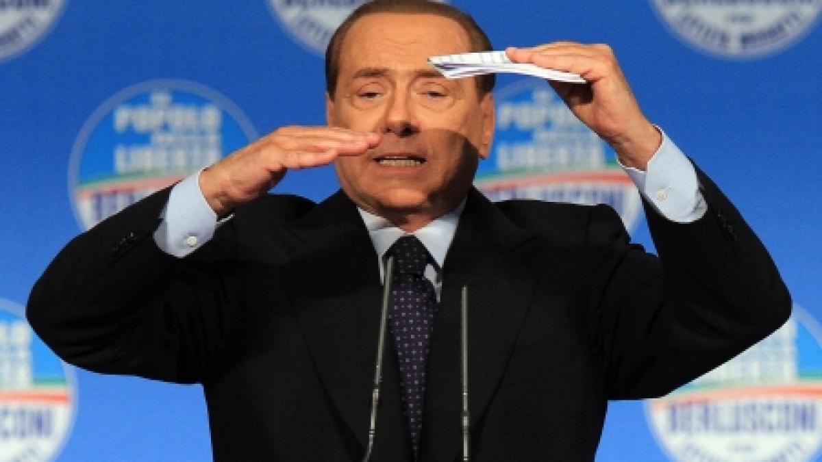 Berlusconi, întâmpinat cu proteste şi huiduieli la Milano