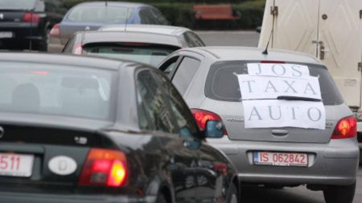 Modificarea taxei auto, amânată până săptămâna viitoare. Borbely propune reducerea taxei cu 20-30%