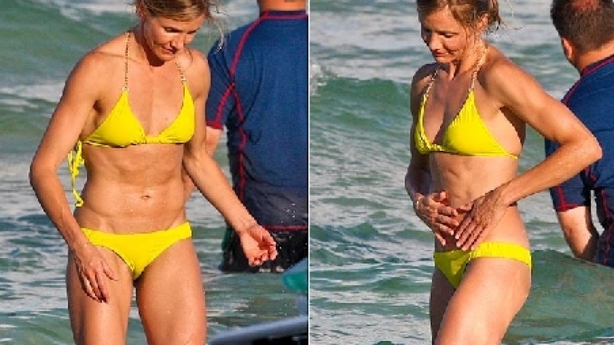 Cameron Diaz îşi etalează abdomenul plat şi ferm, pe o plajă din L.A.