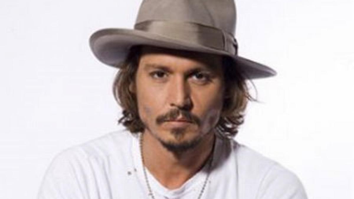 Johnny Depp, exasperat de celebritate: Şedinţele foto sunt ca un viol