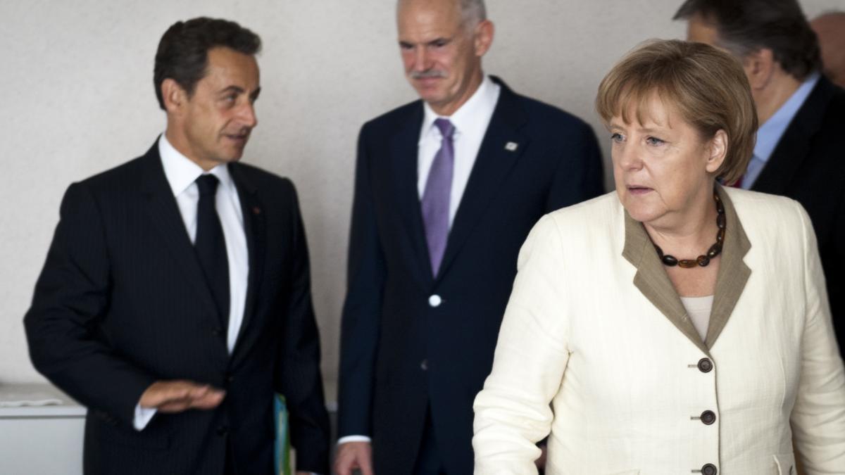 Sarkozy şi Merkel îl bagă în şedinţă pe Papandreou. Grecia jonglează cu viitorul nostru