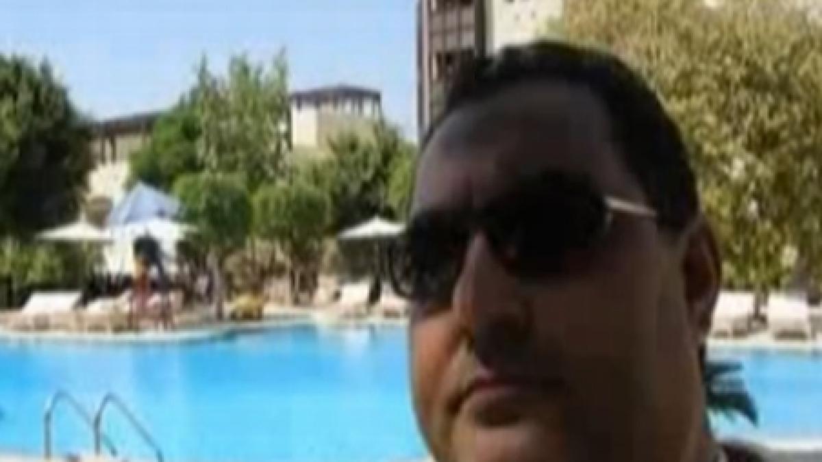 Boenică, interlop urmărit internaţional, se ascunde de poliţie la piscină