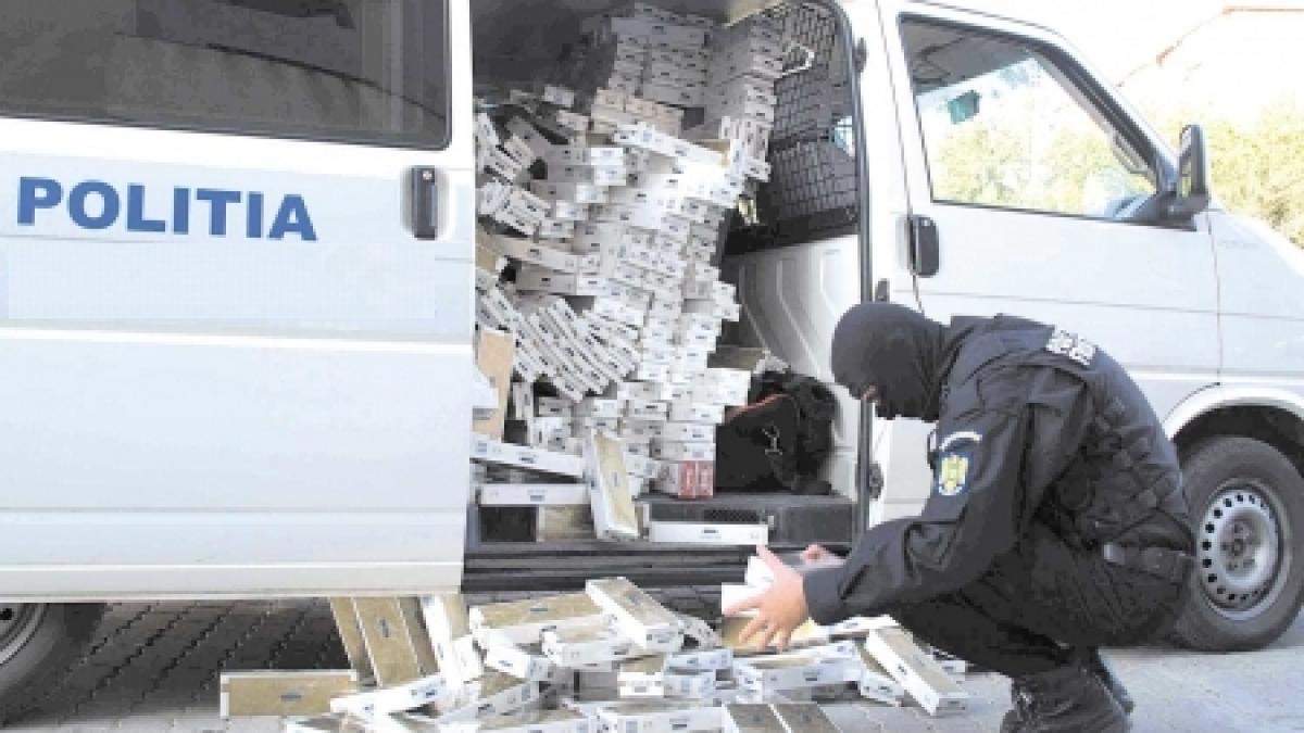 Percheziţii la Timiş, Hunedoara şi Alba. Poliţia caută persoane care fac contrabandă cu ţigări