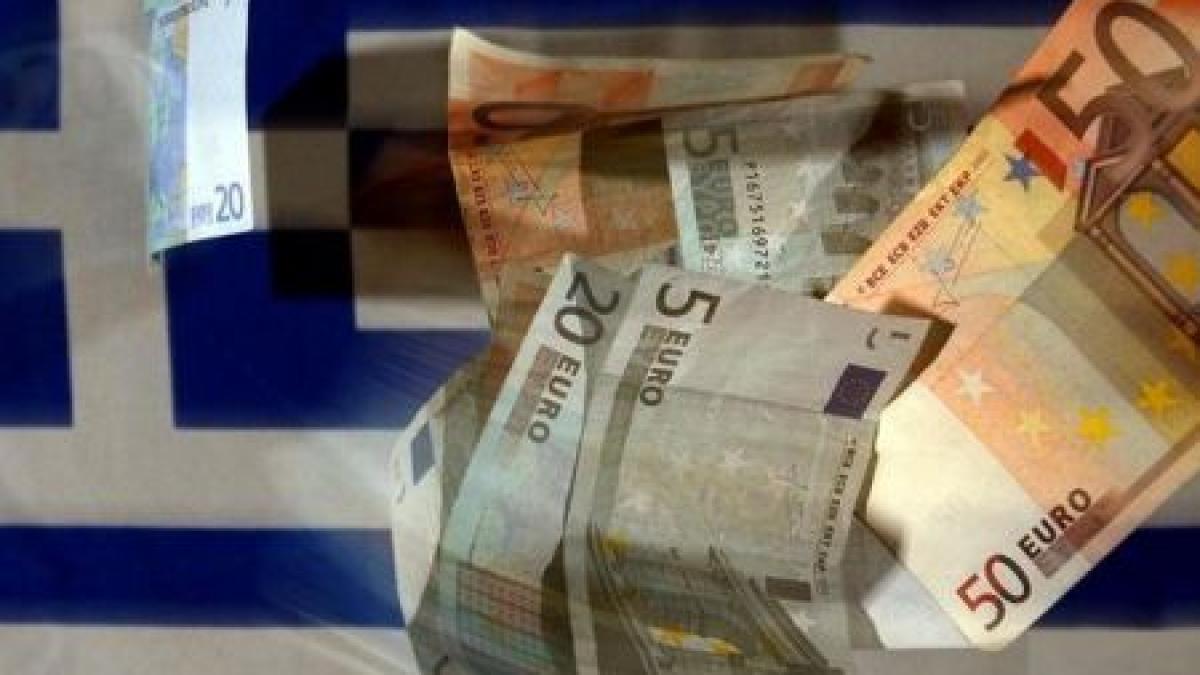 Miniştrii de Finanţe din zona euro au aprobat al doilea acord pentru Grecia