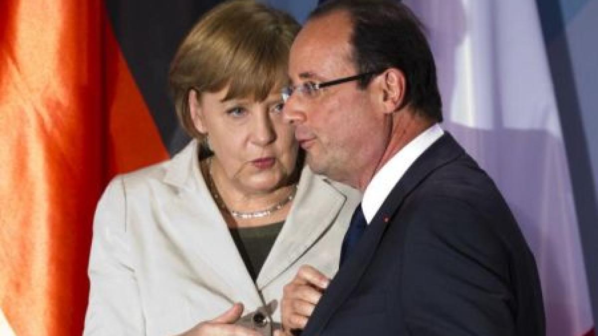 Hollande şi Merkel nu reuşesc să ajungă la o înţelegere în privinţa pactului bugetar, dar vor să păstreze Grecia în zona euro