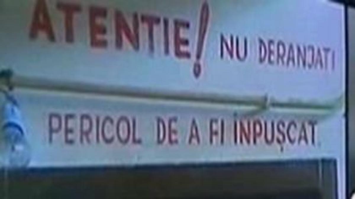 &quot;Nu deranjaţi! Pericol de a fi ÎNPUŞCAŢI&quot;, în loc de &quot;Bine aţi venit!&quot;