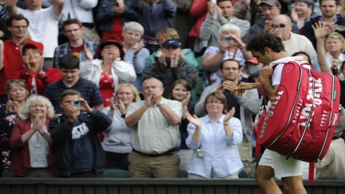 &quot;Miercurea neagră&quot; de la Wimbledon: Federer şi Sharapova, eliminaţi într-o zi cu şapte abandonuri