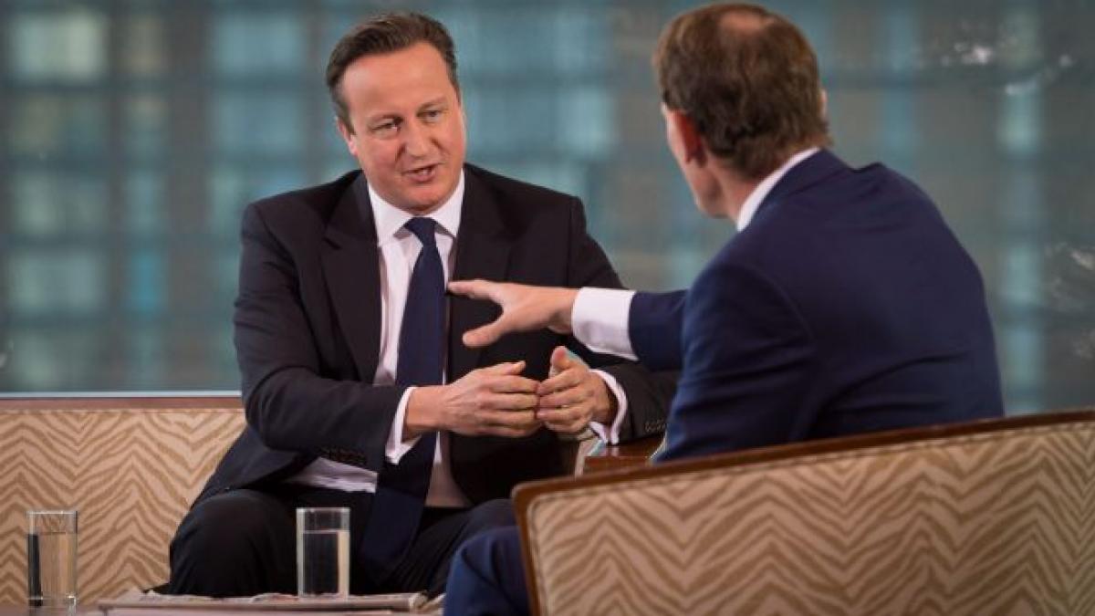 David Cameron: Criza bugetară din SUA, un risc pentru economia mondială