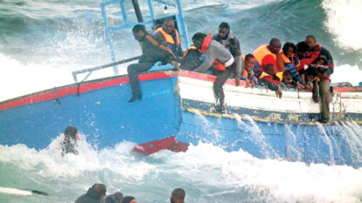 boat-with-500-libya-refugees-runs-aground-in-italy-2011-05-08_l.jpg