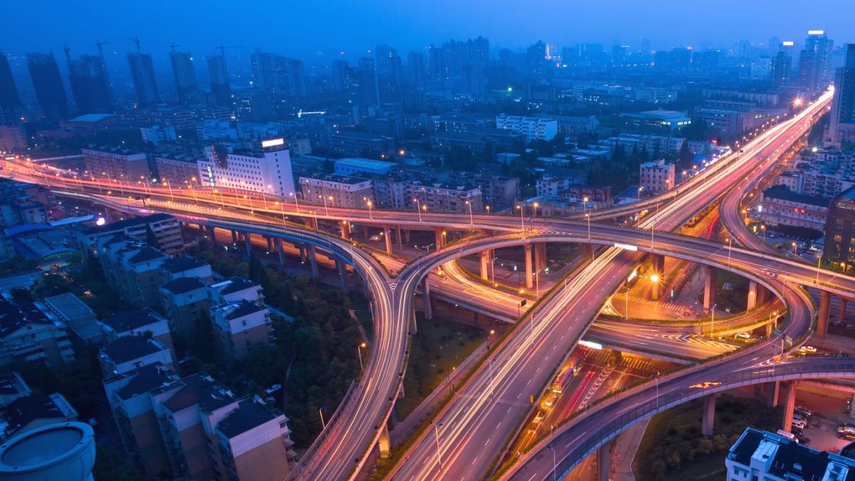 night_city_blue_mist_motion_light_night_metropolis_lights_flyover_traffic_road_58952_1366x768.jpg