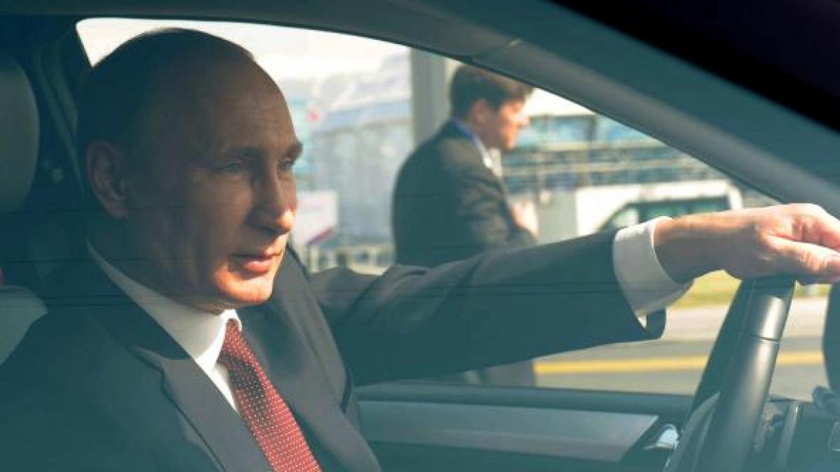 474608003-russias-president-vladimir-putin-sits-in-a-car-after-a.jpg.CROP.promovar-mediumlarge.jpg