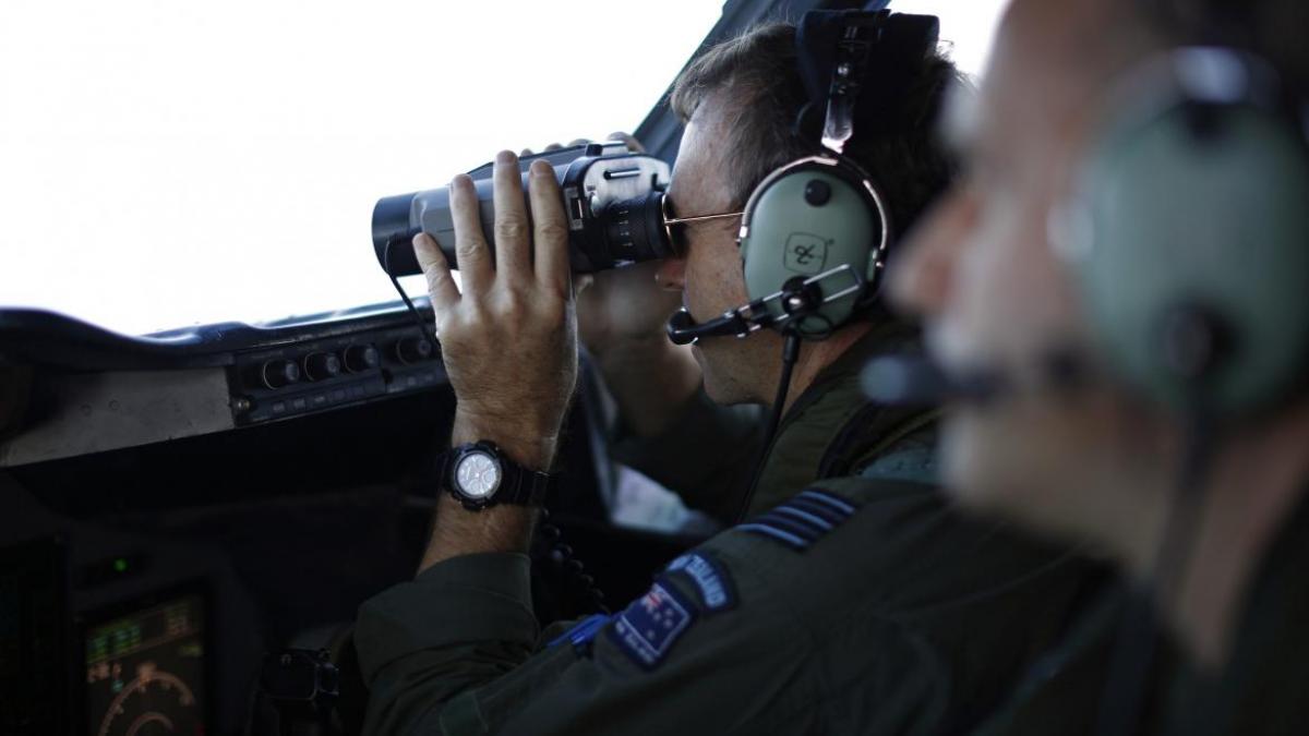 mh370-search-binoculars-march-29.jpg