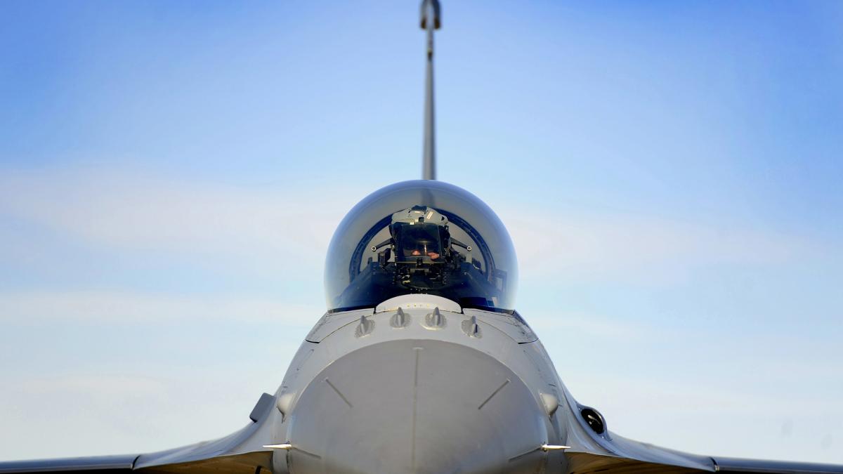 A_U.S._Air_Force_pilot_from_the_79th_Fighter_Squadron_gets_situated_in_the_cockpit_of_his_F-16_Fighting_Falcon_prior_to_takeoff_for_exercise_Red_Flag_at_Nellis_Air_Force_Base,_Nev.,_on_Feb_130225-F-CJ989-901.jpg