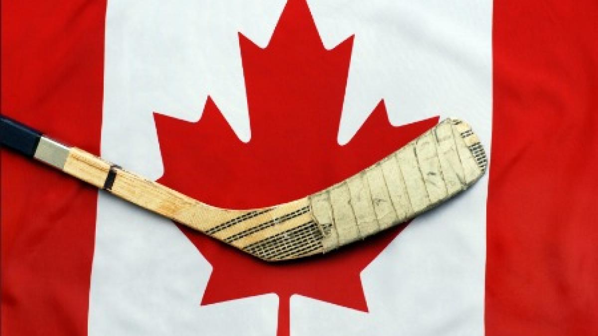 hockey-stick-and-canadian-flag.jpg