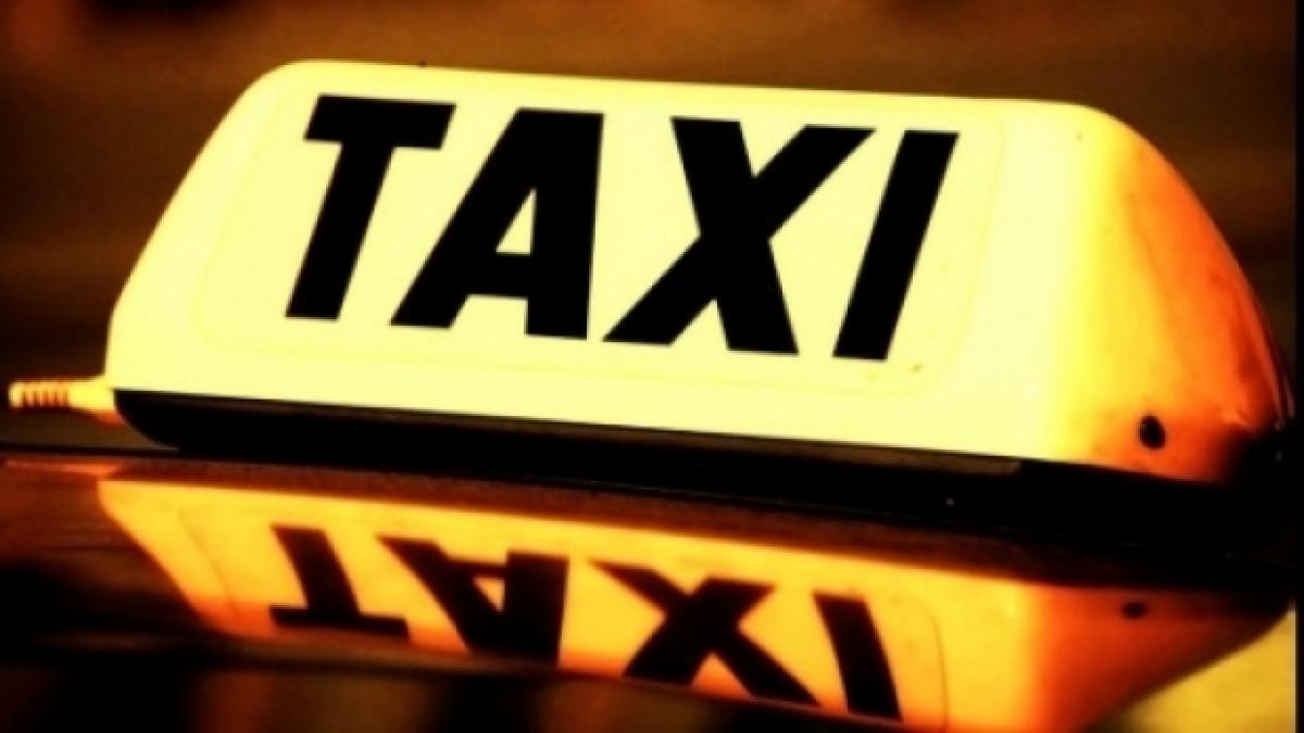 taxi_sign_64212400_82848000.jpg