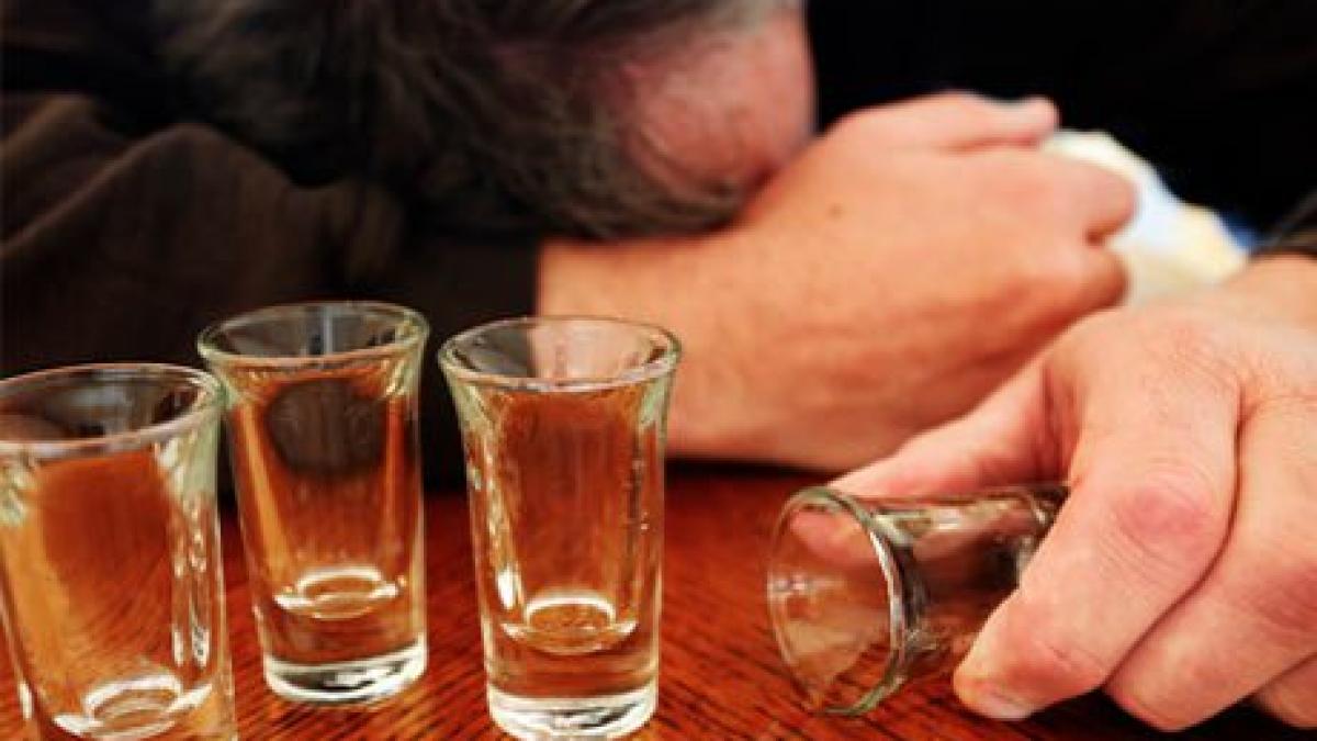 drunk-man-with-empty-shot-glasses460x300.jpg