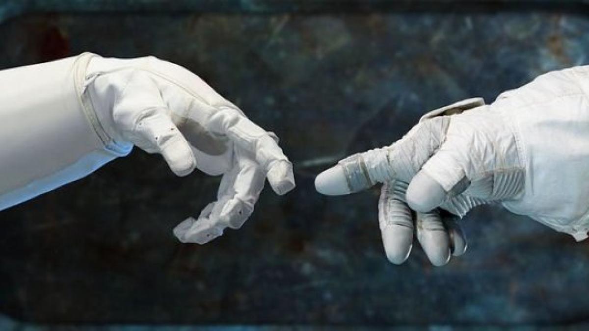 news-astronaut-hands.jpg