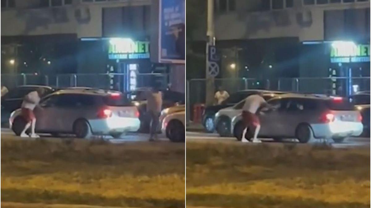 momentul in care un sofer este agresat de doi barbati in trafic la semafor in bucuresti