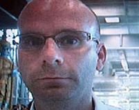 Pedofilul căutat de Interpol este canadianul Christopher Paul Neil
