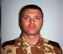 Trupul neînsufleţit al militarului român ucis în Afganistan va fi adus, luni, în ţară 
