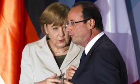 Hollande şi Merkel nu reuşesc să ajungă la o înţelegere în privinţa pactului bugetar, dar vor să păstreze Grecia în zona euro