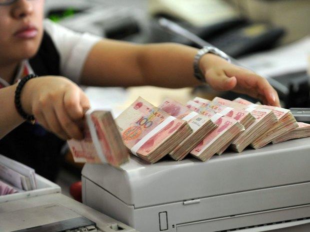 China vrea o taxă pe tranzacţii financiare