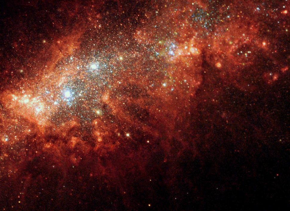 Nearby_galaxy_NGC_1569_is_a_hotbed_of_star_birth_activity.jpg