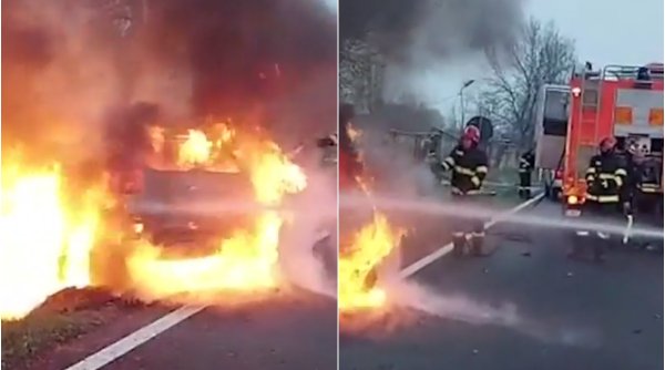 Femeie la un pas de moarte, după ce mașina cu care a intrat în șanț a luat foc