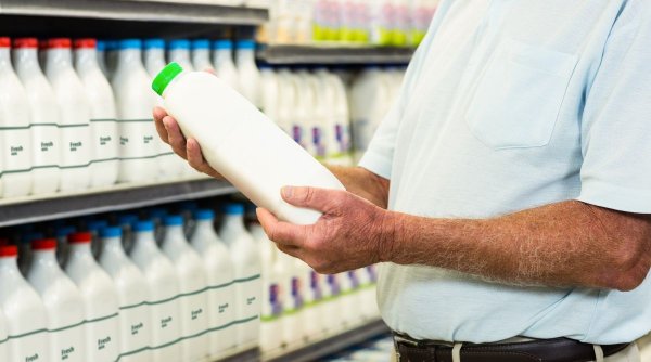 Consiliul Concurenţei a amendat trei mari companii de lactate din România cu 2,9 milioane euro