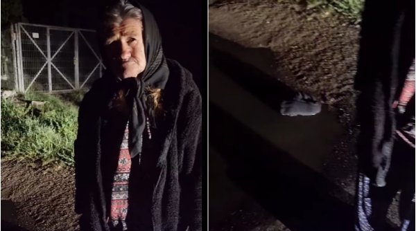 Momentul în care o bătrână de 64 de ani a ajuns să își spele rufele într-o baltă, pe drum. Femeia locuiește într-o stație de autobuz 