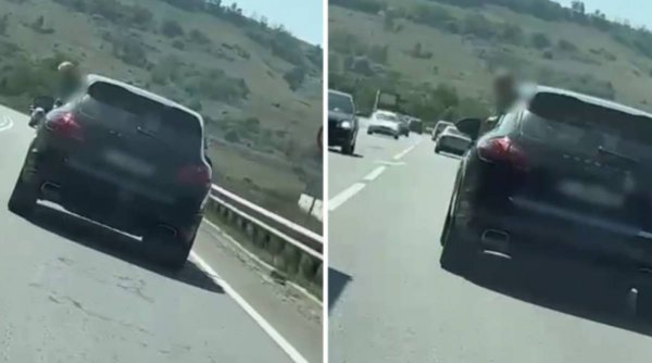 Moment înfiorător pe șosea! Un copil a ieșit pe geamul mașinii în timp ce tatăl lui conducea cu 90 km/h